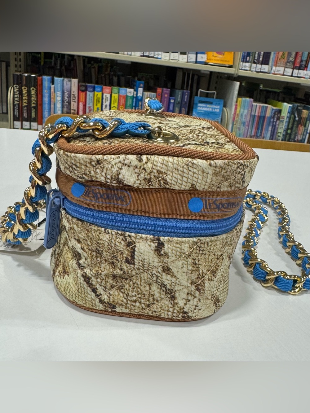 Lesportsac Snake Print Crossbody Bag with Blue and Brown Accents - Picture 2 of 8